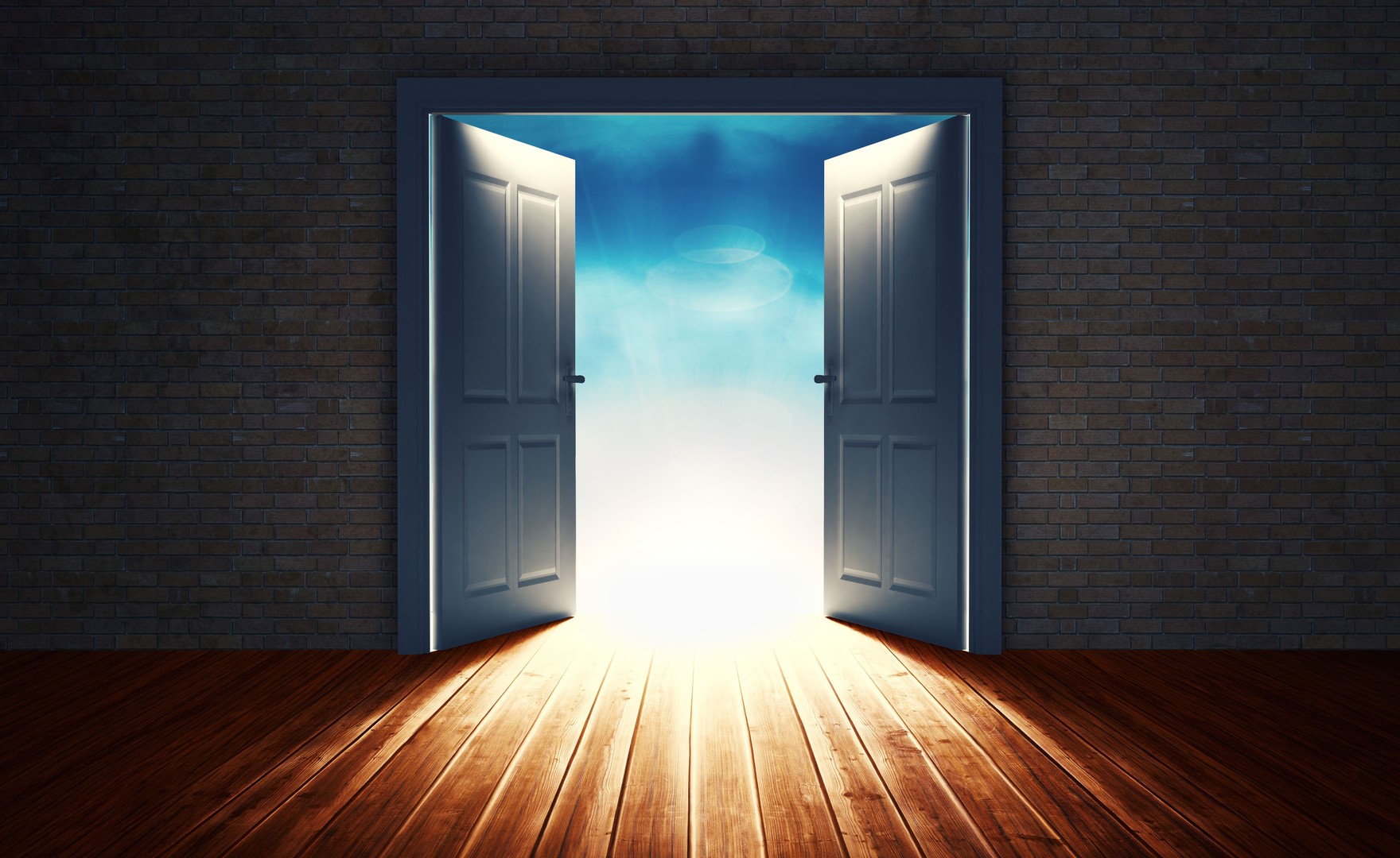 Double doors in dark room opening outward into blue light
