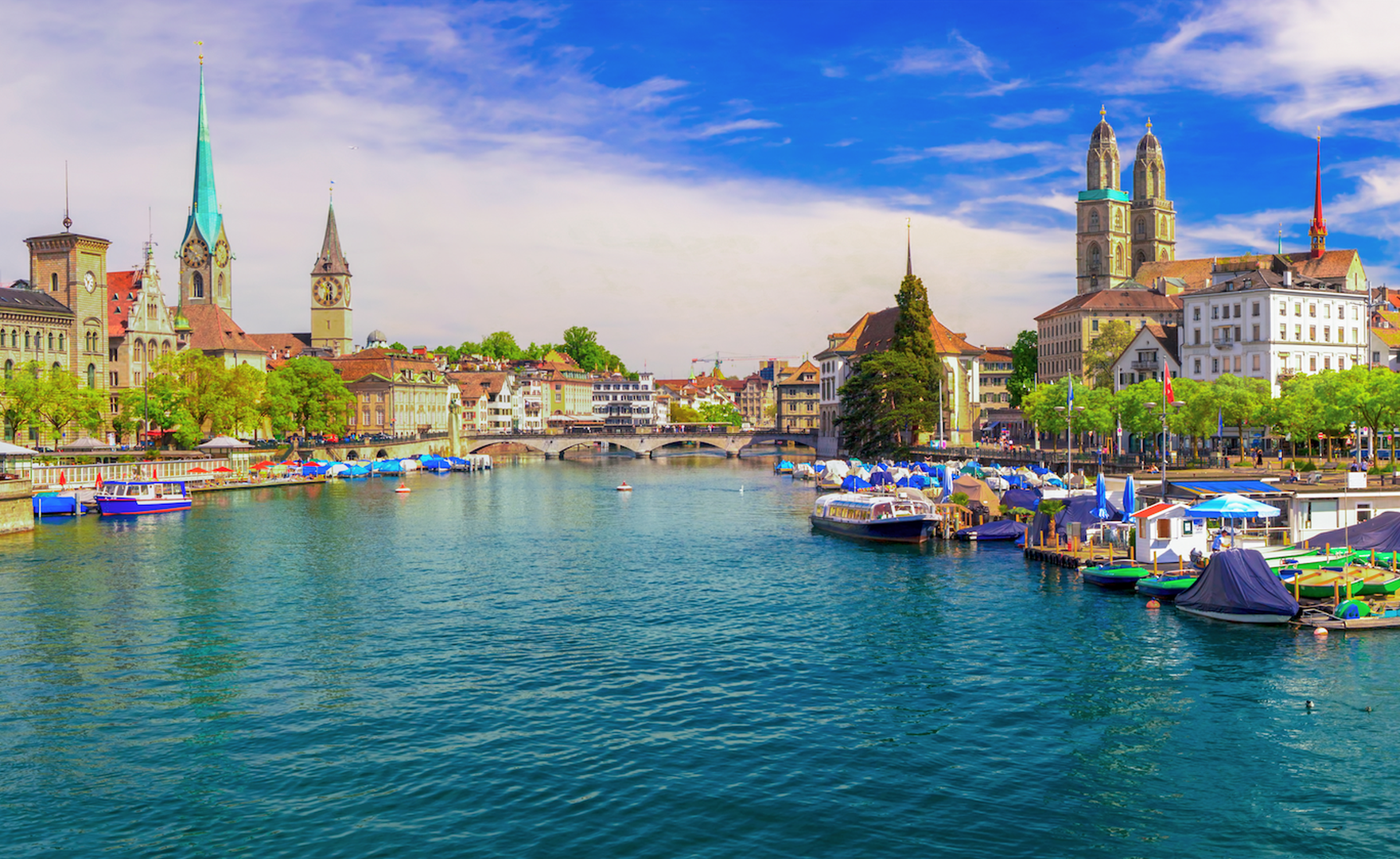 Photo of Zurich on a sunny day from the Limmat river
