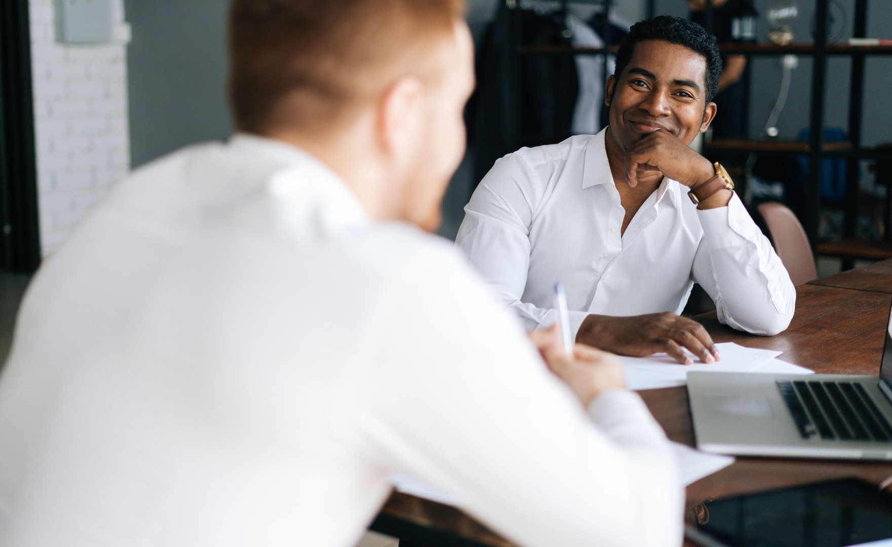 Image of two men in conversation